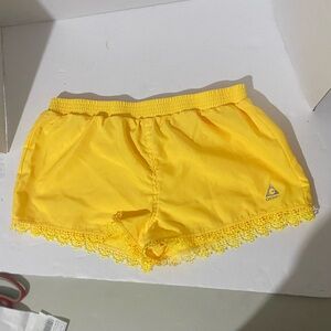 Gerry Junior or Women’s yellow activewear or swim shorts Lg 14/16